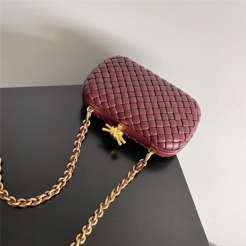 b0tt*ga Ven*ta wine red knot clutch