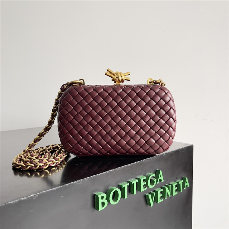 b0tt*ga Ven*ta wine red knot clutch