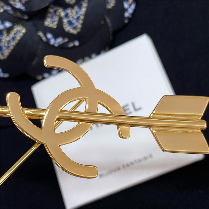 Ch**el cupid’s arrow brooch