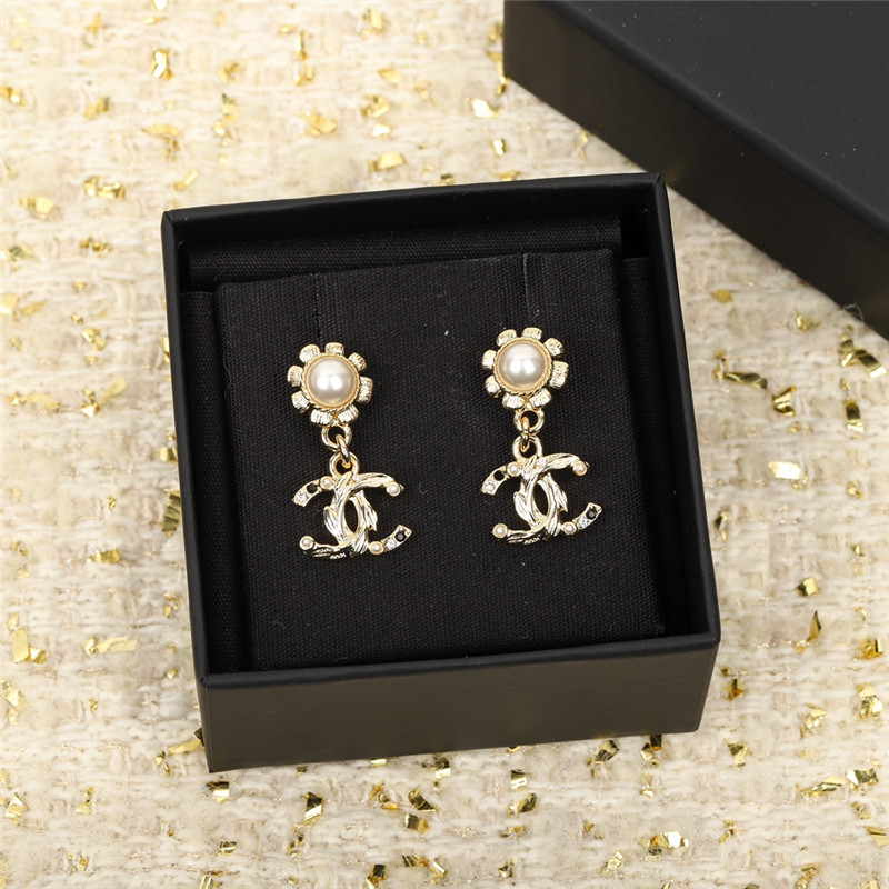 Chanel sunflower earrings