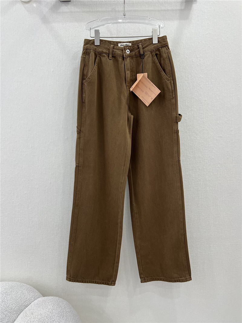 miumiu waistband letter patch logo embellished jeans