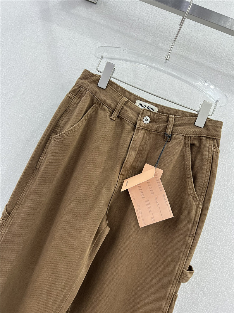 M1um1u waistband letter patch logo embellished jeans