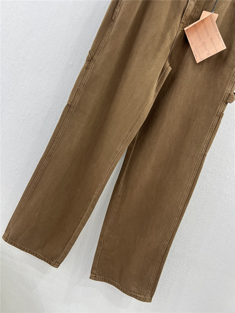 M1um1u waistband letter patch logo embellished jeans