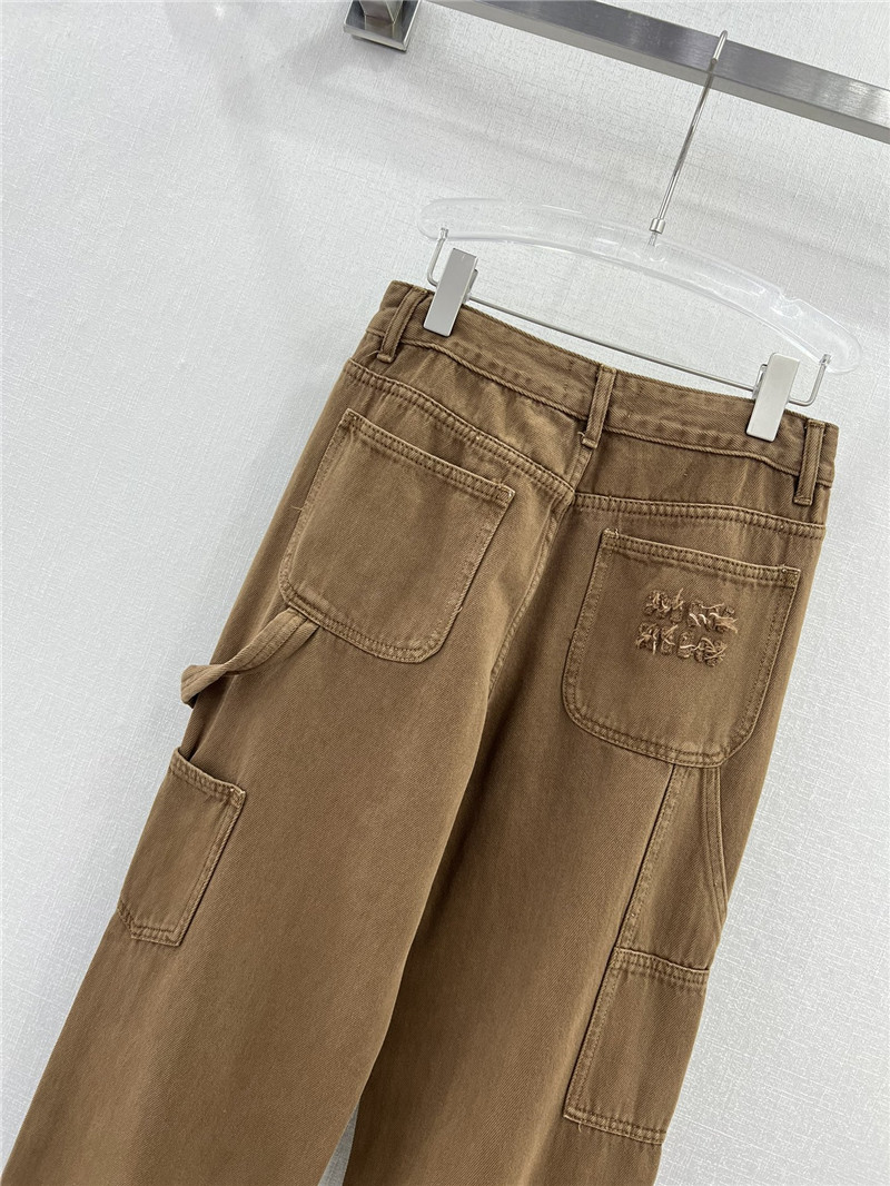 M1um1u waistband letter patch logo embellished jeans