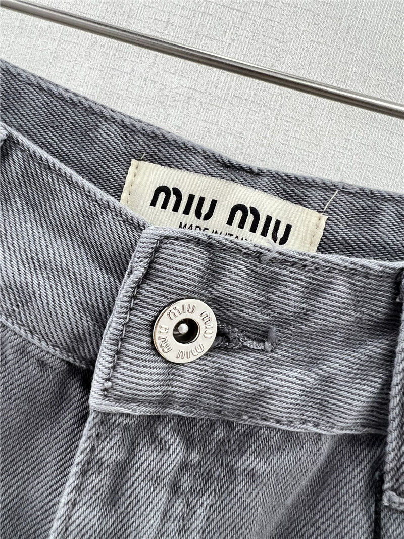 miumiu waistband letter patch logo embellished jeans