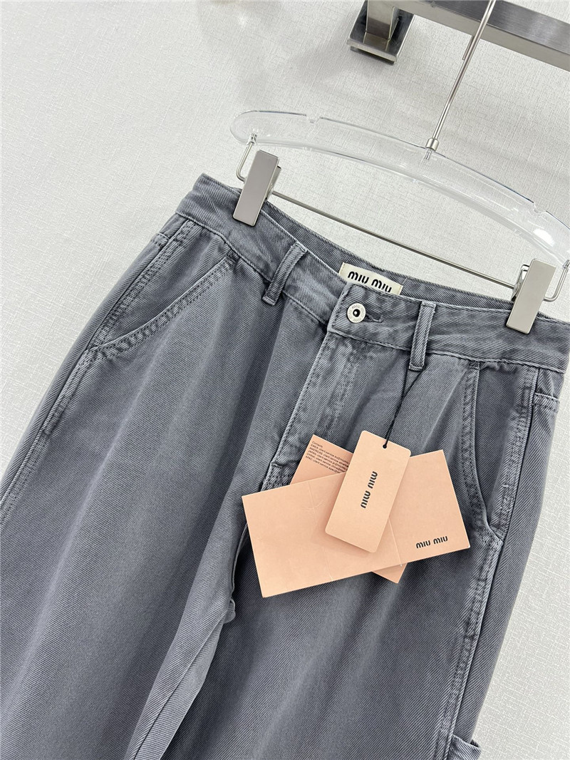 miumiu waistband letter patch logo embellished jeans