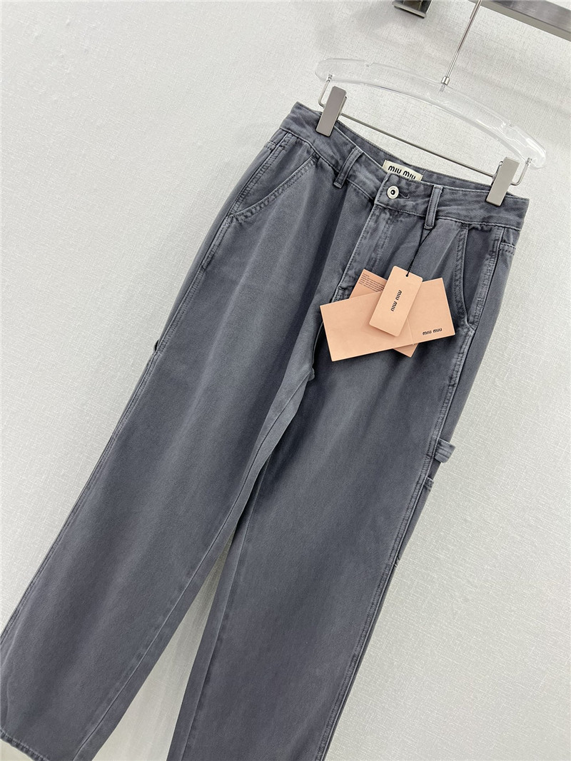 miumiu waistband letter patch logo embellished jeans