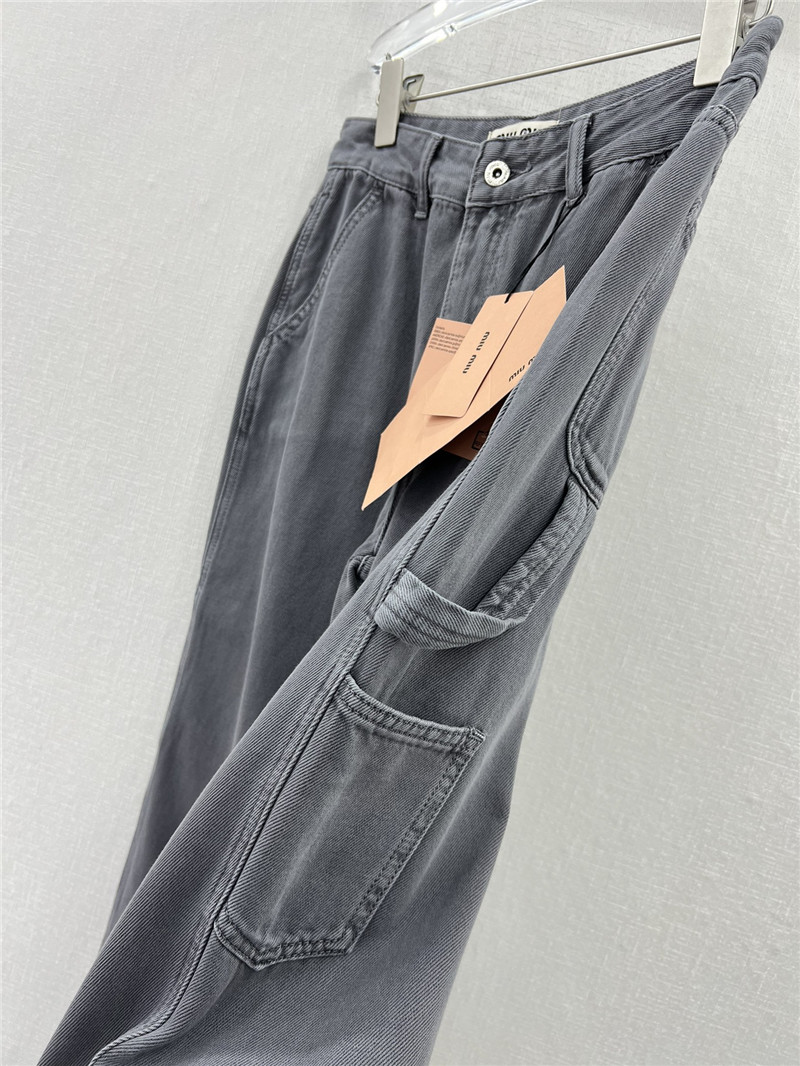 miumiu waistband letter patch logo embellished jeans