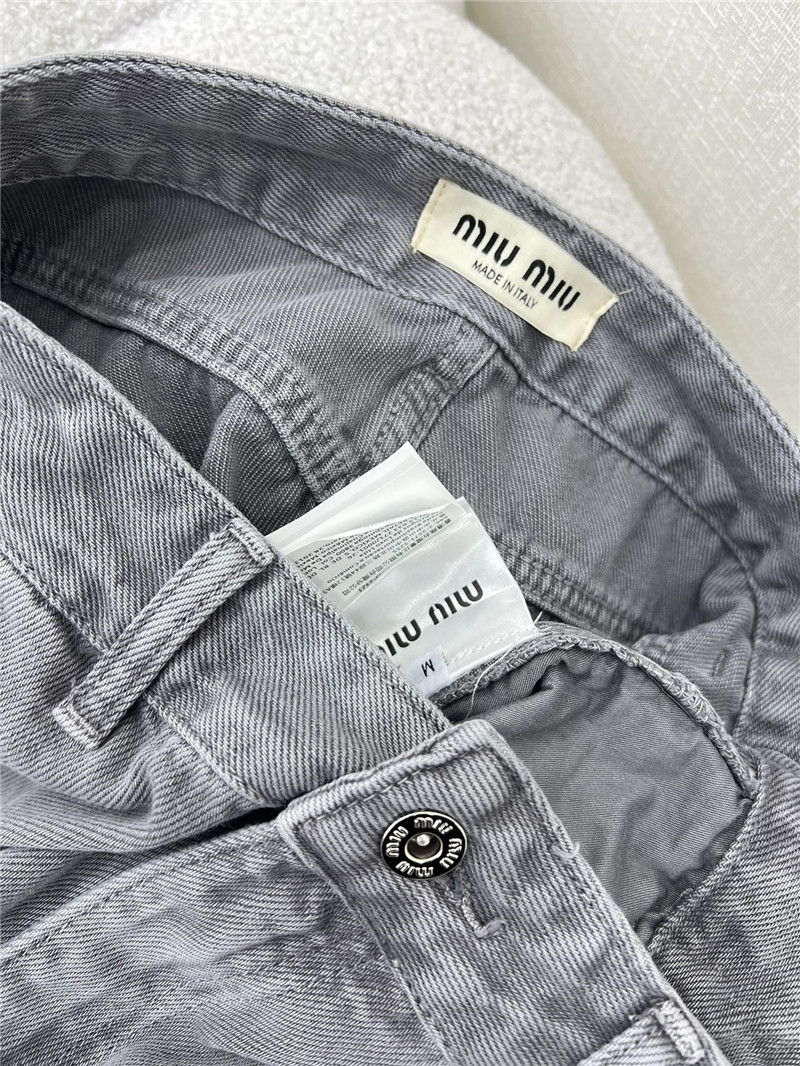 miumiu waistband letter patch logo embellished jeans