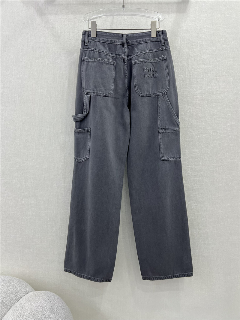 miumiu waistband letter patch logo embellished jeans