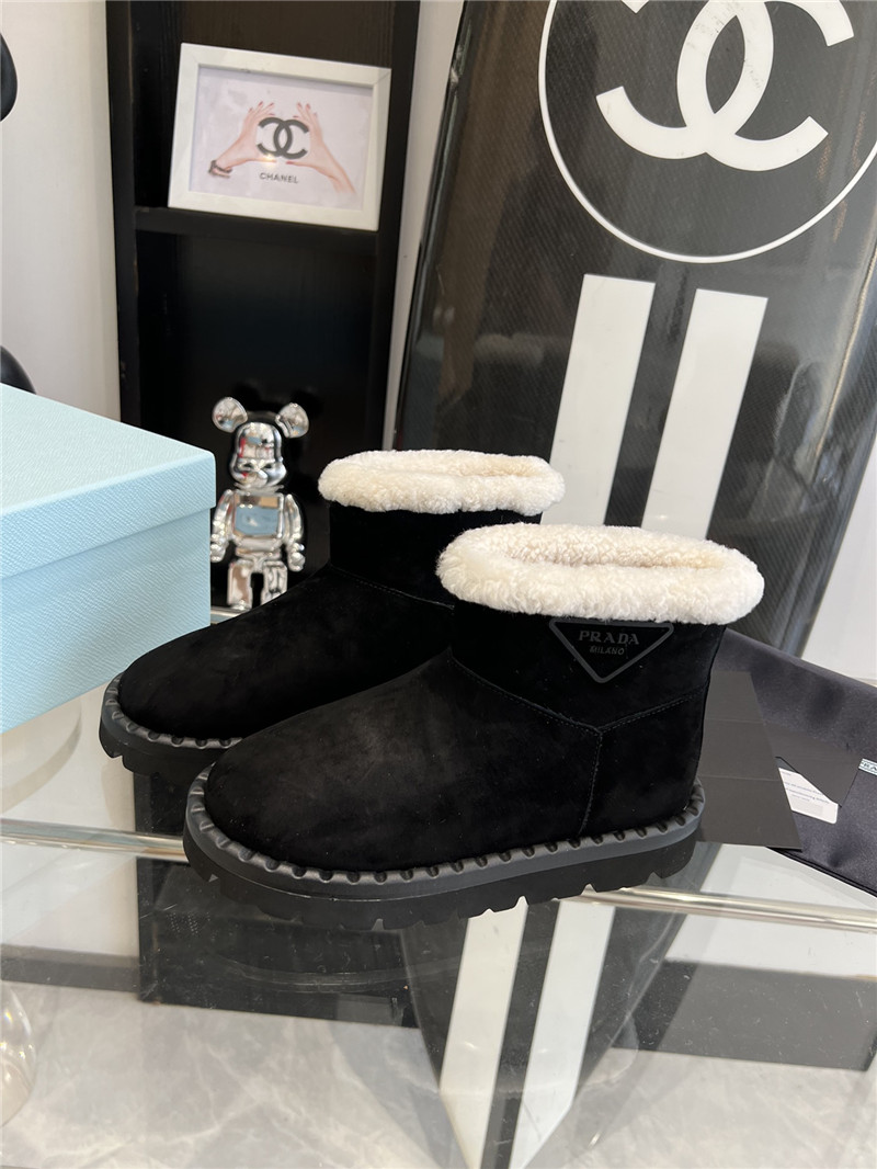 Prada Triangle-Logo Suede Boots in Black