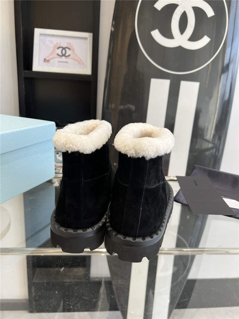 Pra*a triangle-logo suede boots in black