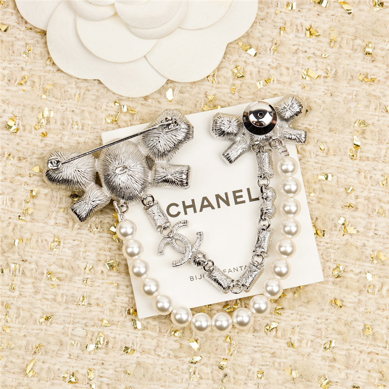 Ch**el bow double c brooch