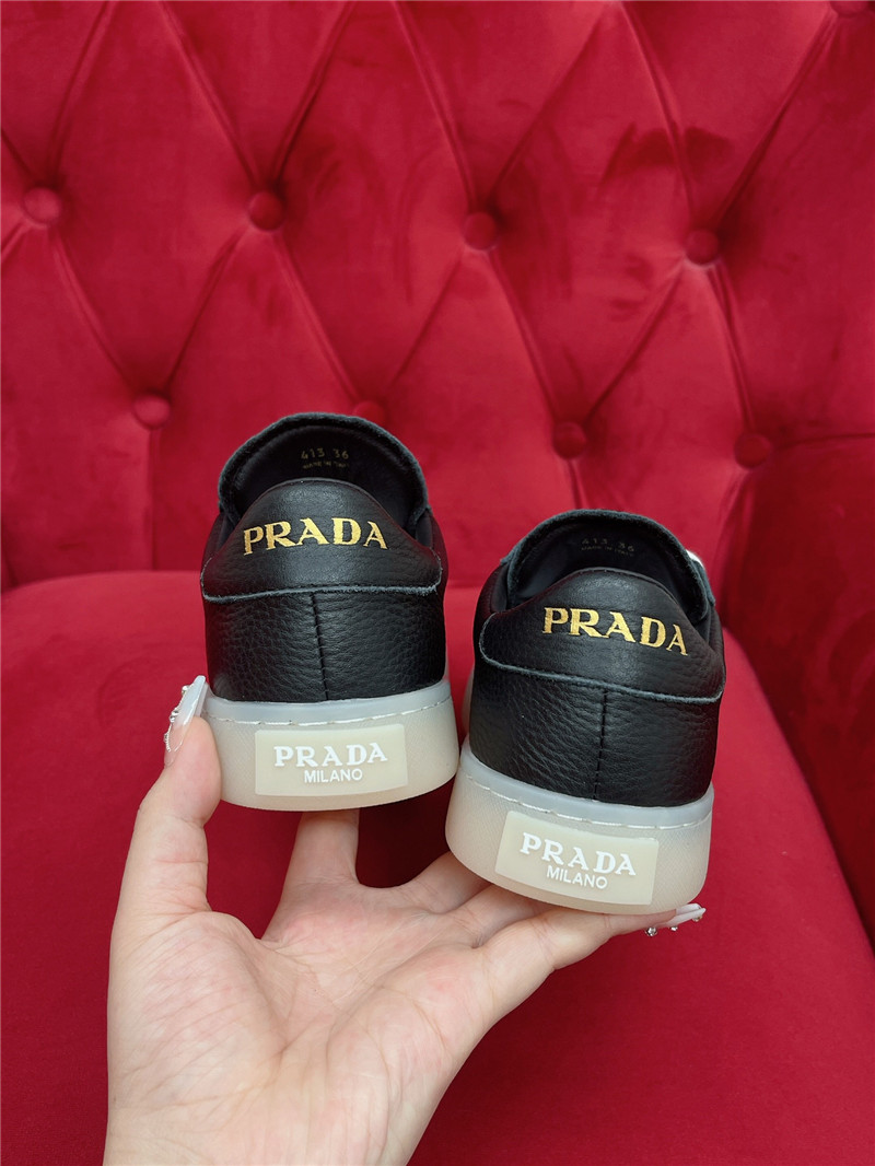 Pra*a black leather women’s sneakers