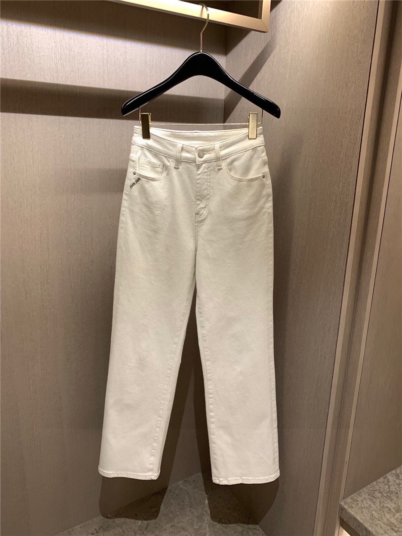 miumiu pocket embroidered lettering jeans