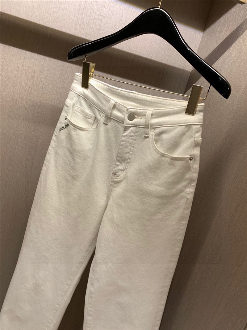 miumiu pocket embroidered lettering jeans