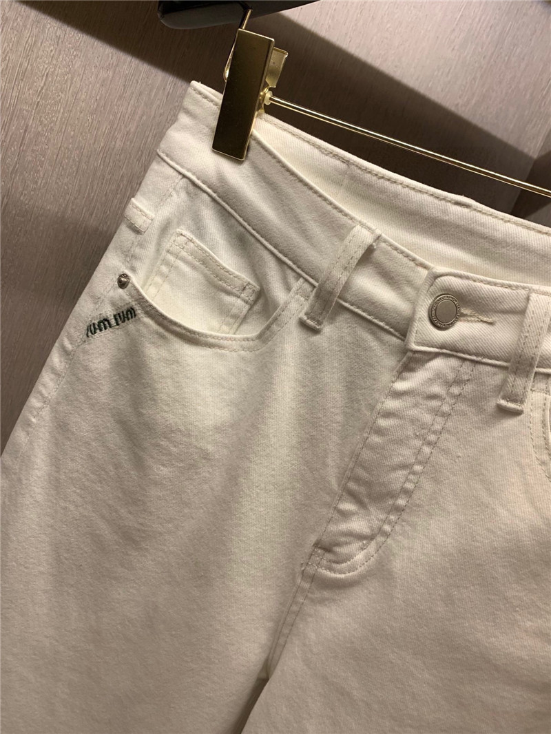 miumiu pocket embroidered lettering jeans