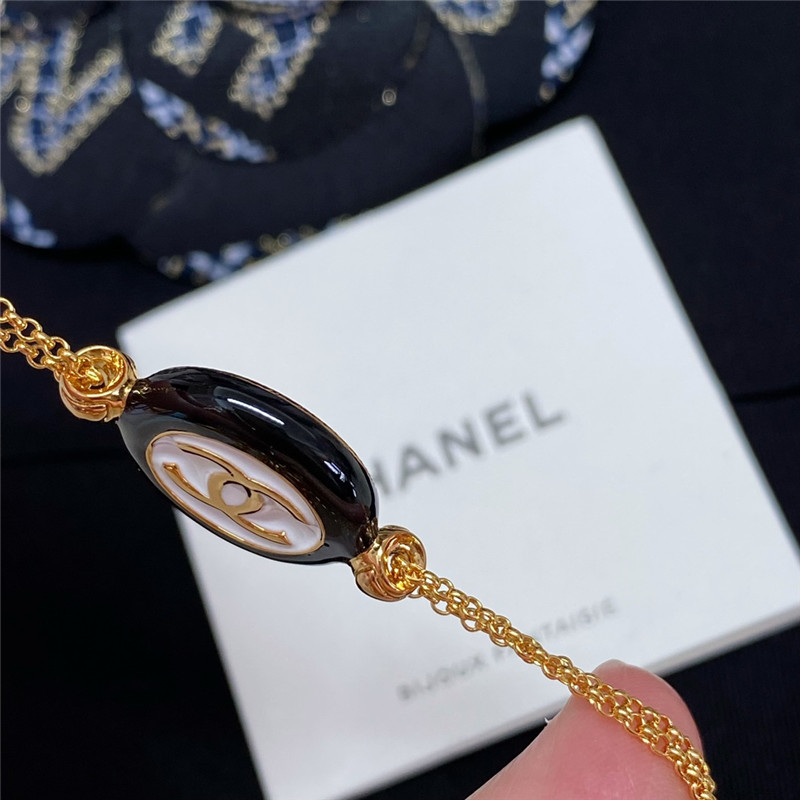 Chanel black and white button double chain bracelet