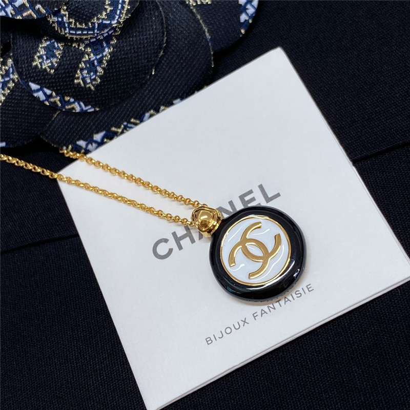 Chanel black and white button necklace