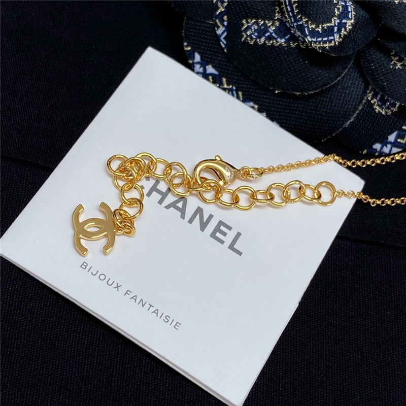 Chanel black and white button necklace