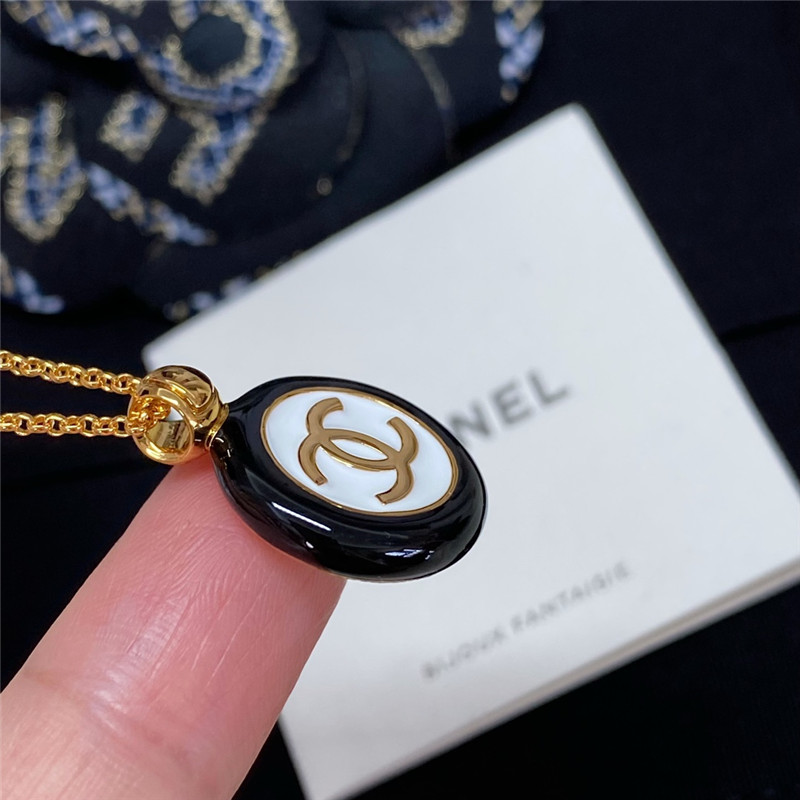 Chanel black and white button necklace
