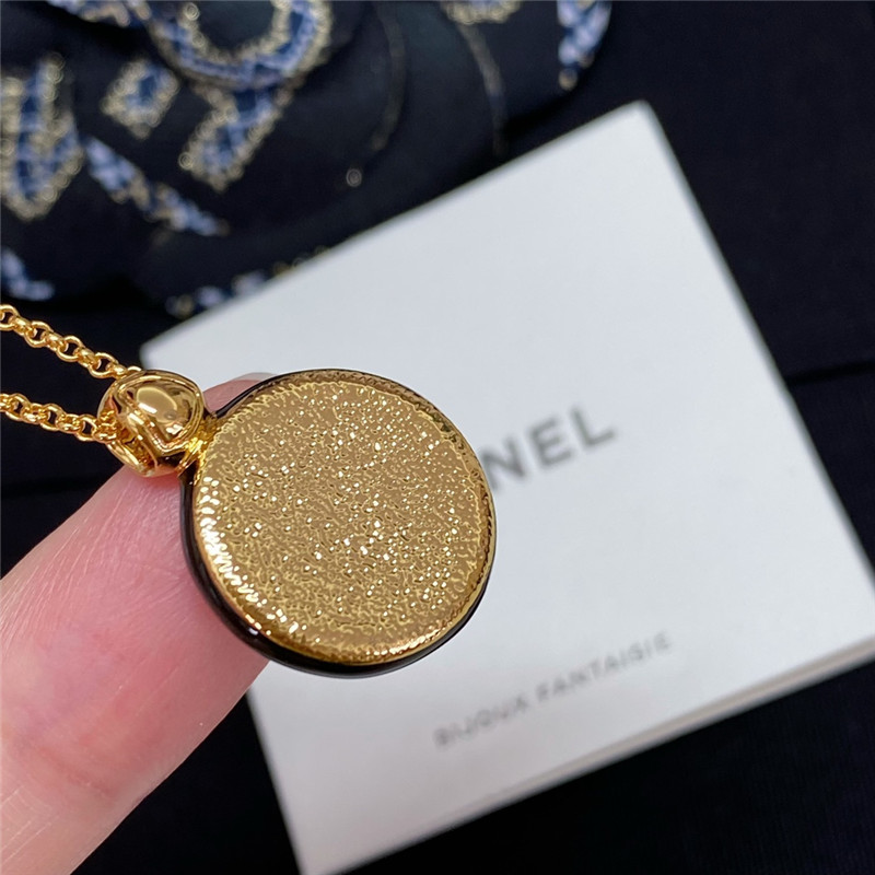 Chanel black and white button necklace