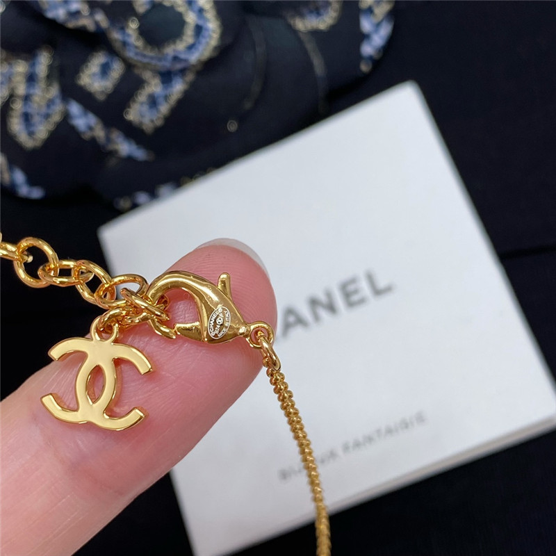 Chanel black and white button necklace