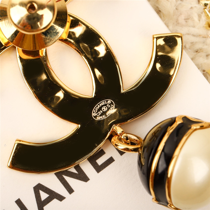 Chanel black enamel hanging pearl brooch