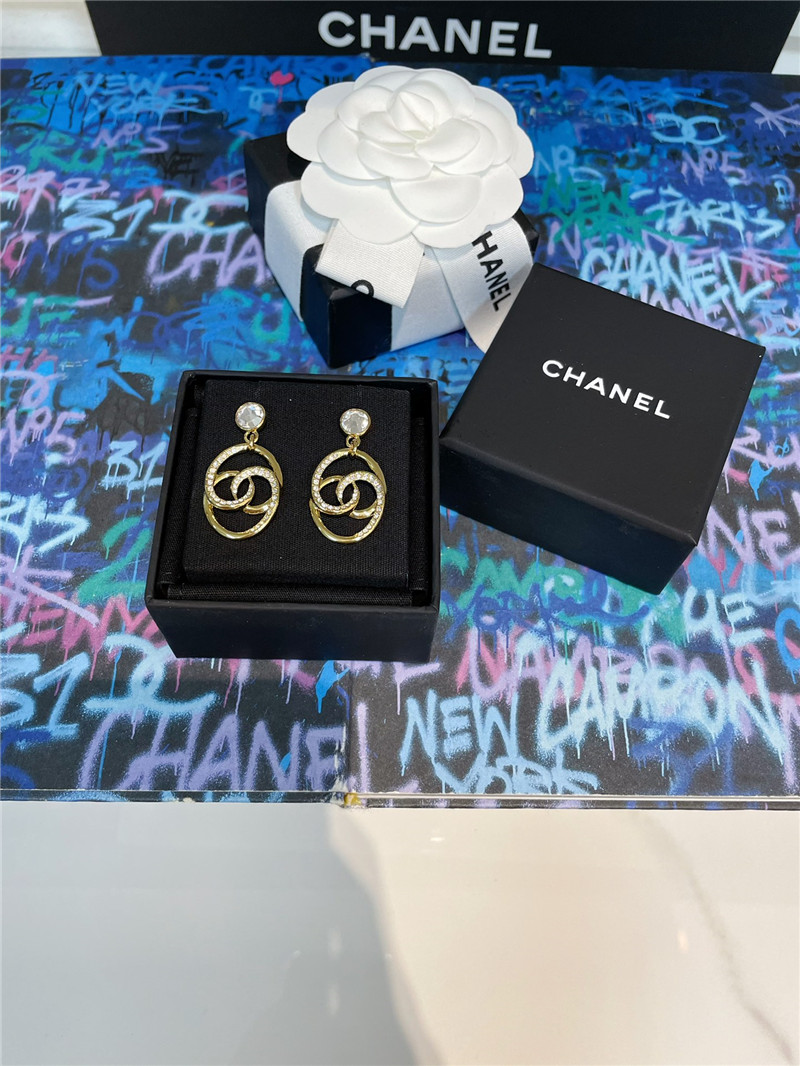 Chanel oval twisted double c half diamond earrings