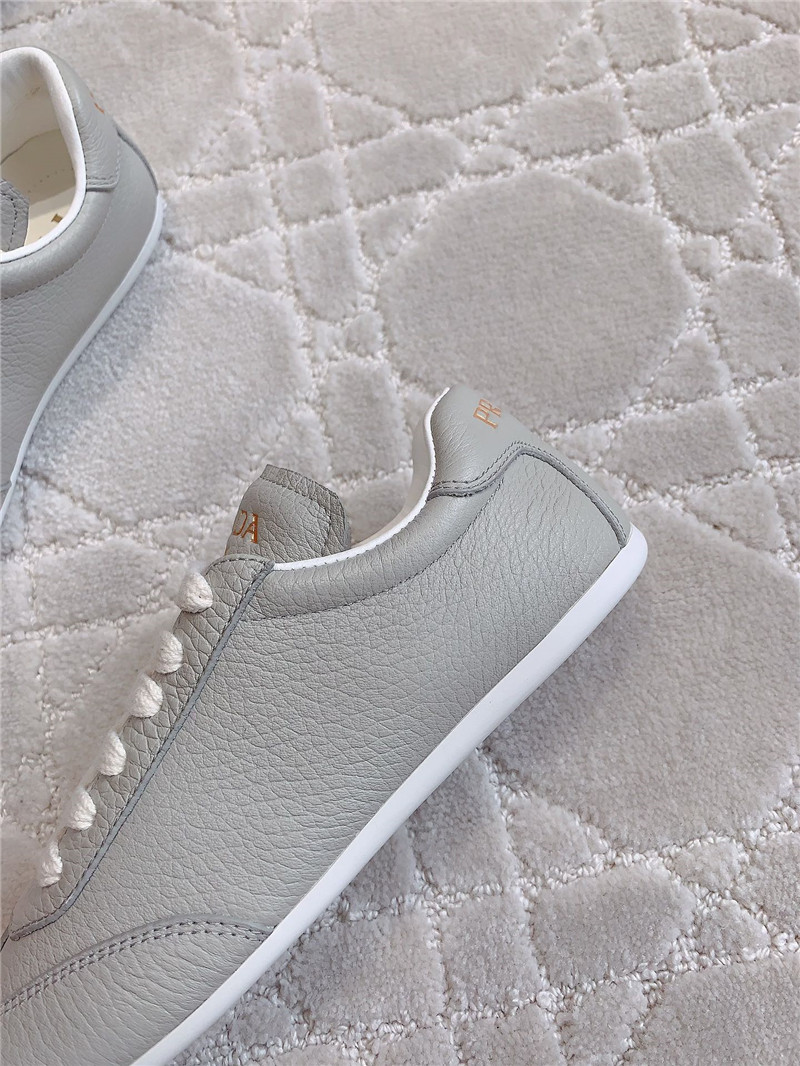 Pra*a triangle logo sneakers in gray