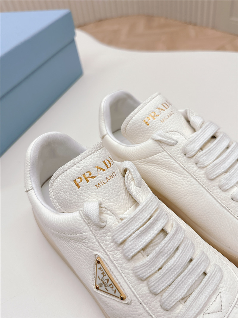Pra*a white leather sneakers for women