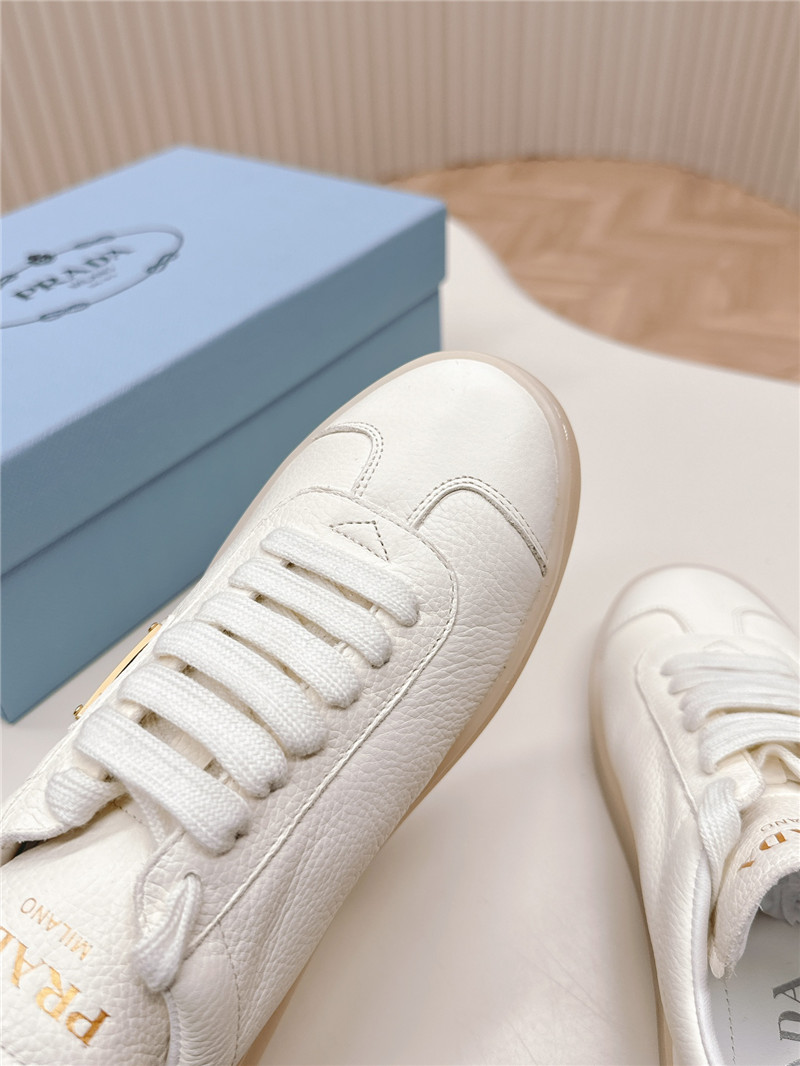 Pra*a white leather sneakers for women