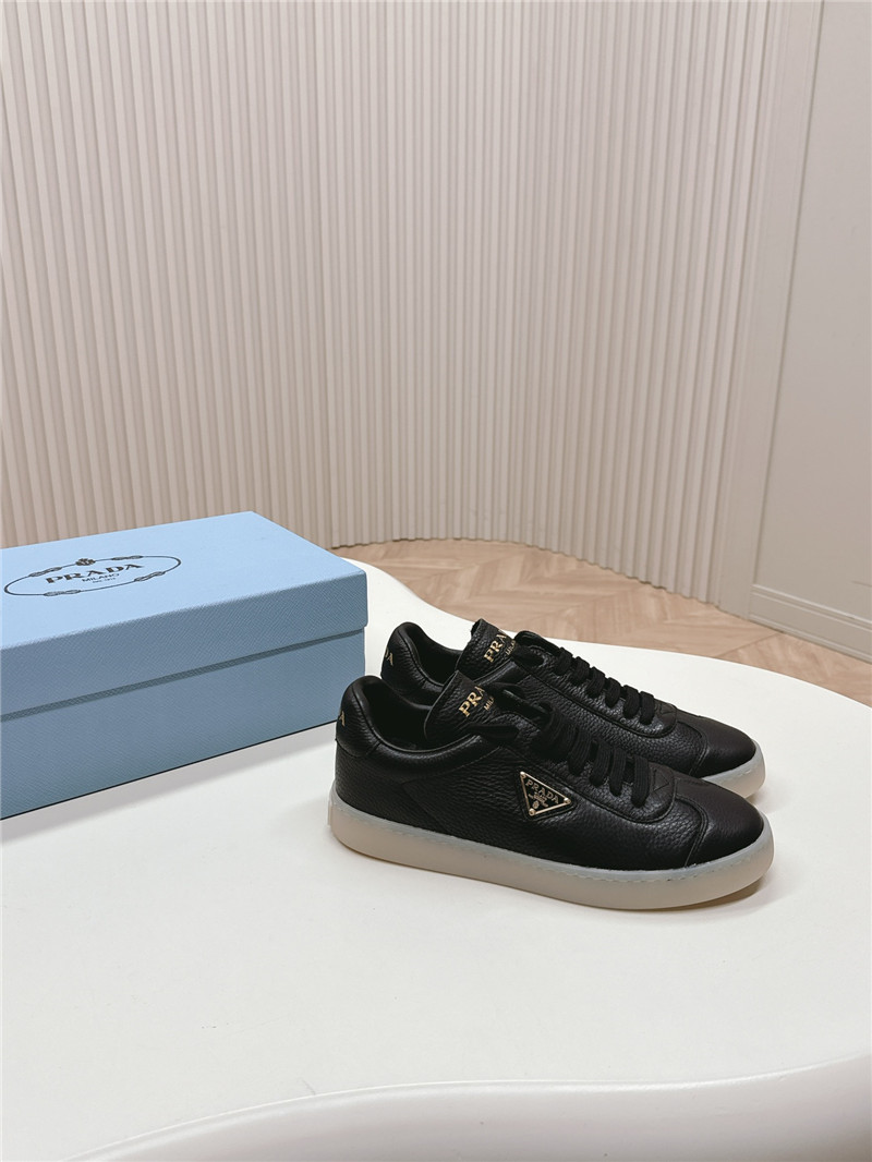 Pra*a black leather sneakers