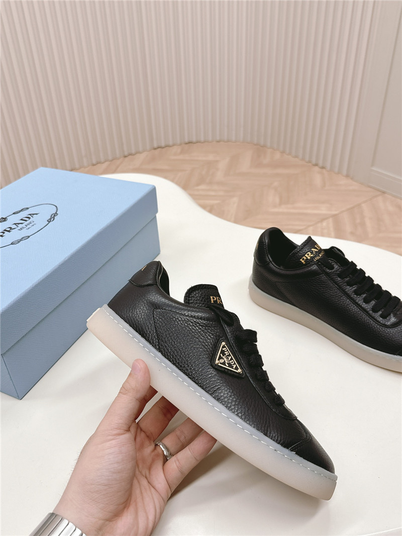 Pra*a black leather sneakers