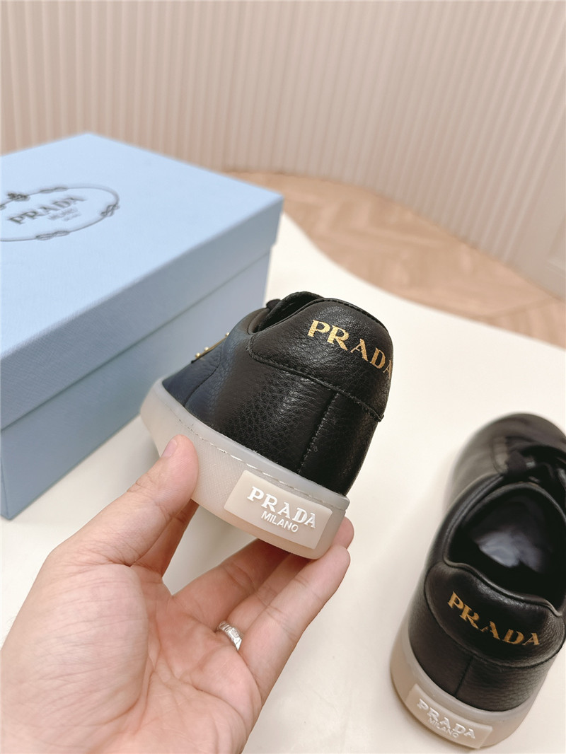 Pra*a black leather sneakers