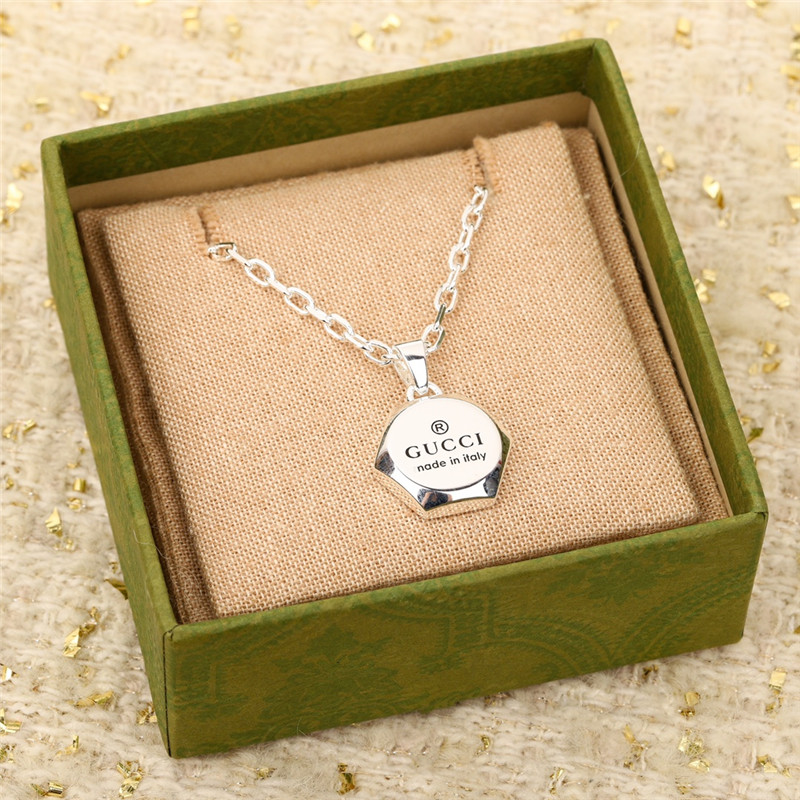 Gucci carved necklace