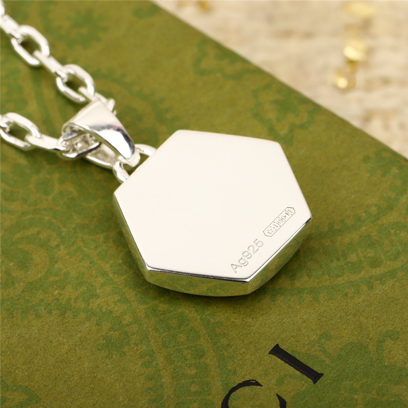 Gvc*1 carved necklace