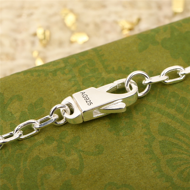 Gvc*1 carved necklace