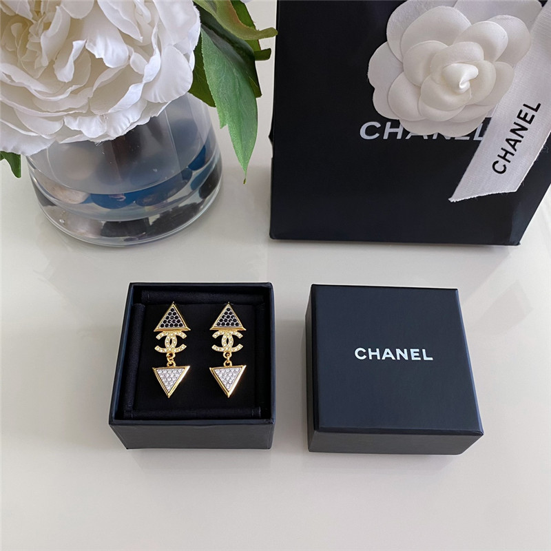 Chanel gold double c triangle black and white diamond earrings