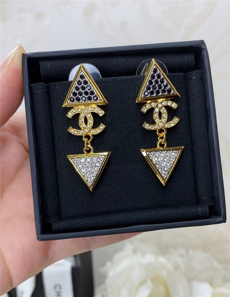 Chanel gold double c triangle black and white diamond earrings