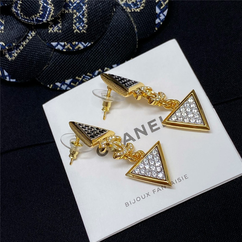Chanel gold double c triangle black and white diamond earrings