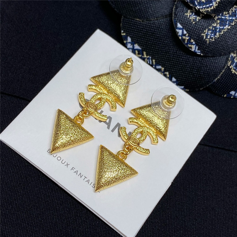 Chanel gold double c triangle black and white diamond earrings