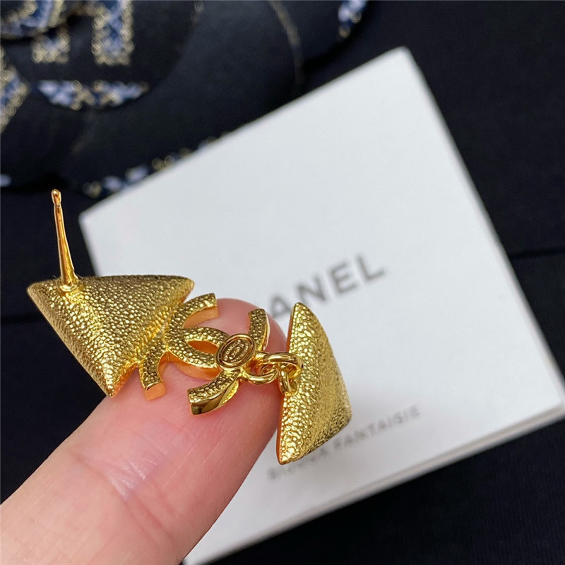 Chanel gold double c triangle black and white diamond earrings