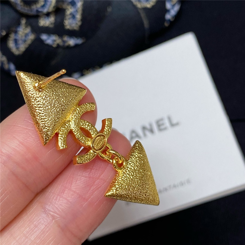 Chanel gold double c triangle black and white diamond earrings