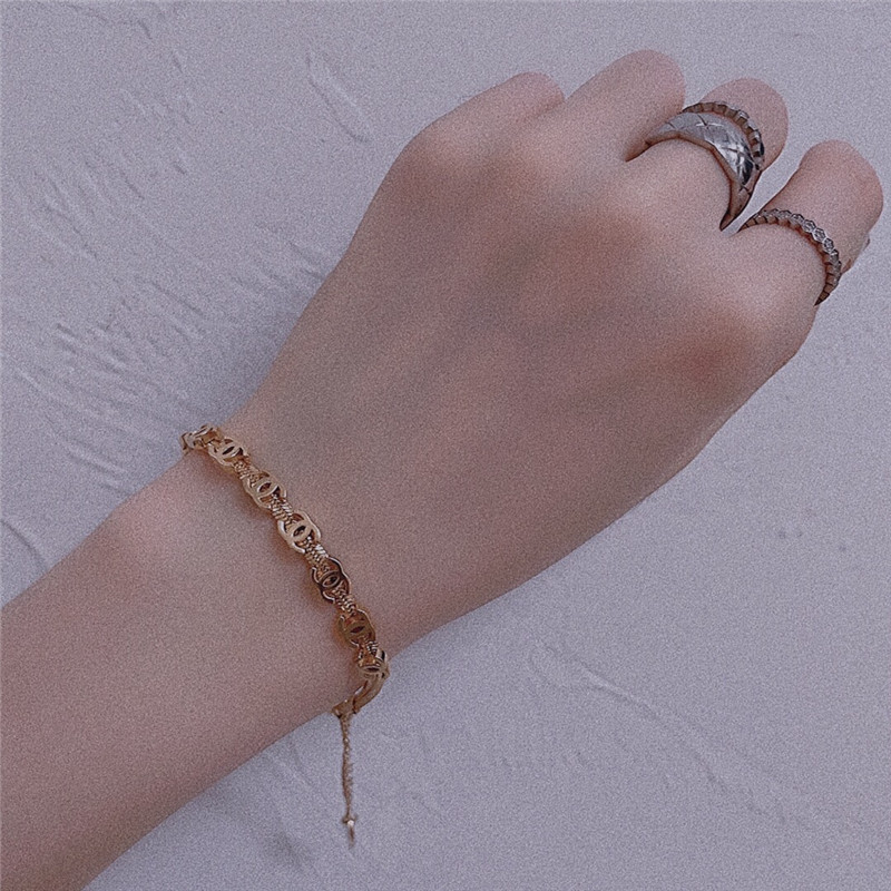 Ch**el gold c snake bone chain bracelet