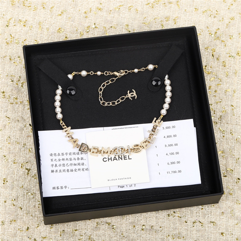 Chanel pearl letter choker necklace