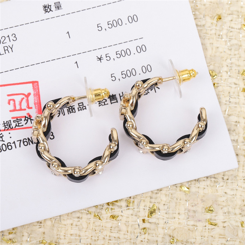 Ch**el handmade leather earrings