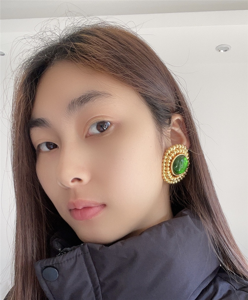 YSL vintage floral ear clips