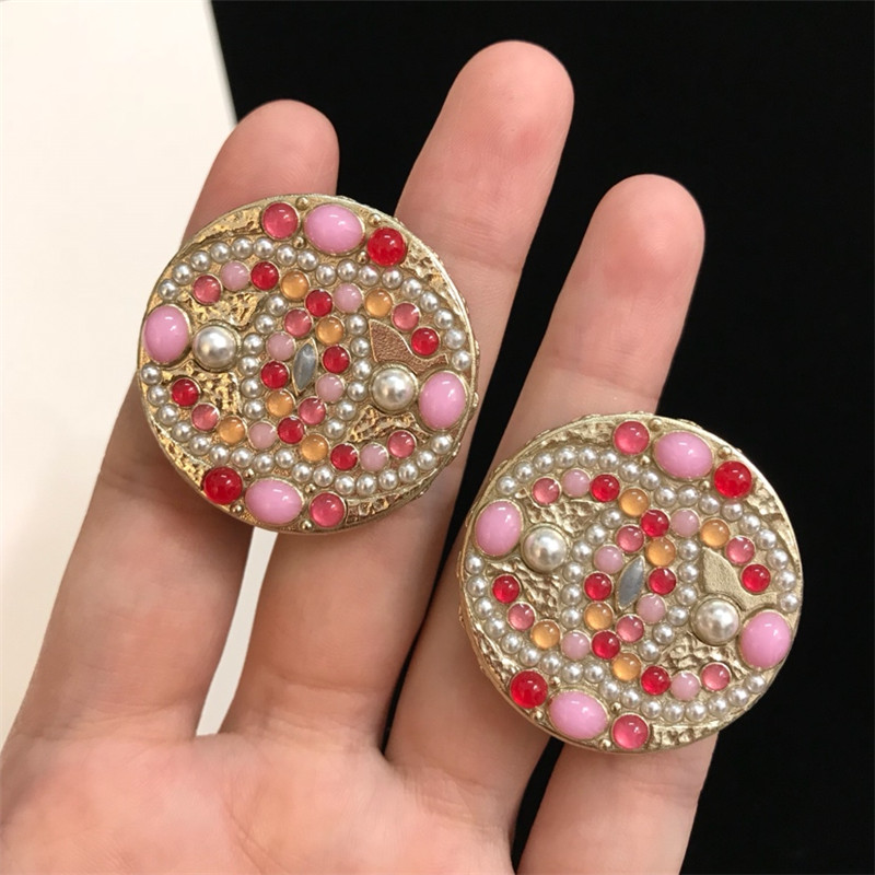 Ch**el double c logo earrings