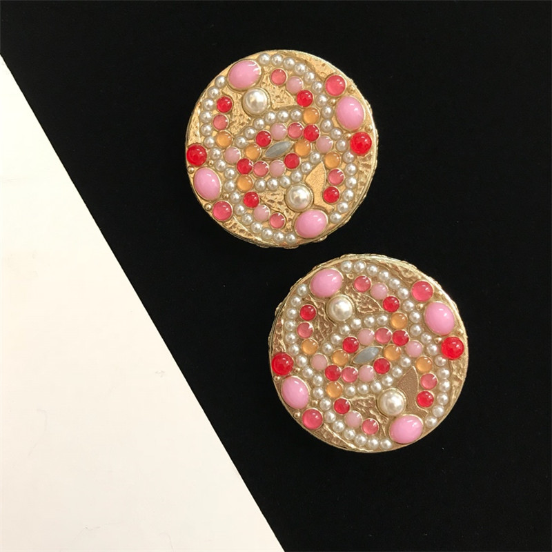 Ch**el double c logo earrings